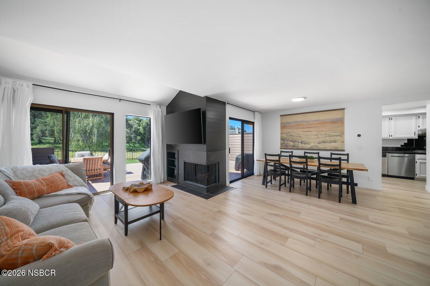 1496 Oakridge Park Road Santa Maria, CA 93455 - Photo 6 of 62 a living room with furniture and a fireplace