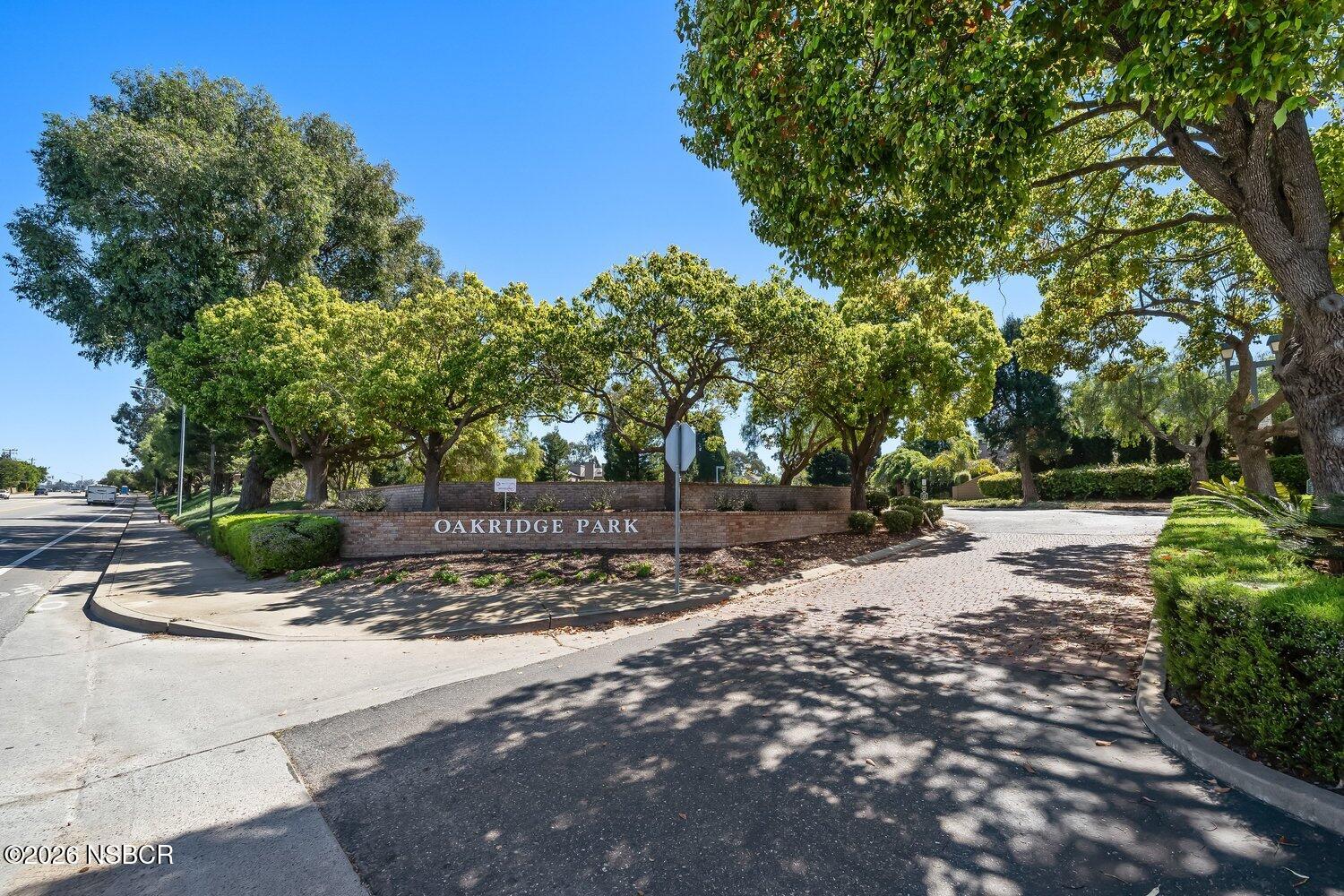 1496 Oakridge Park Road Santa Maria, CA 93455 - Photo 62 of 62 a view of a tree in front of a house