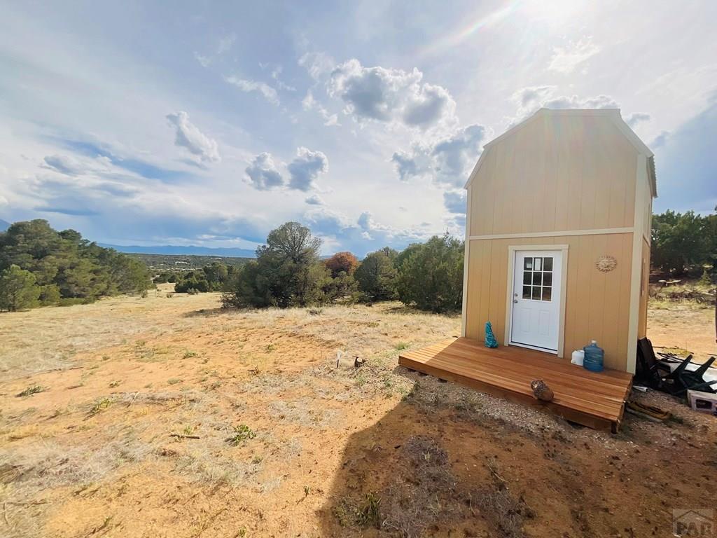 Lot 17 Navajo Ranch Walsenburg, CO 81089 - Photo 14 of 26 a view of a dry yard with a house