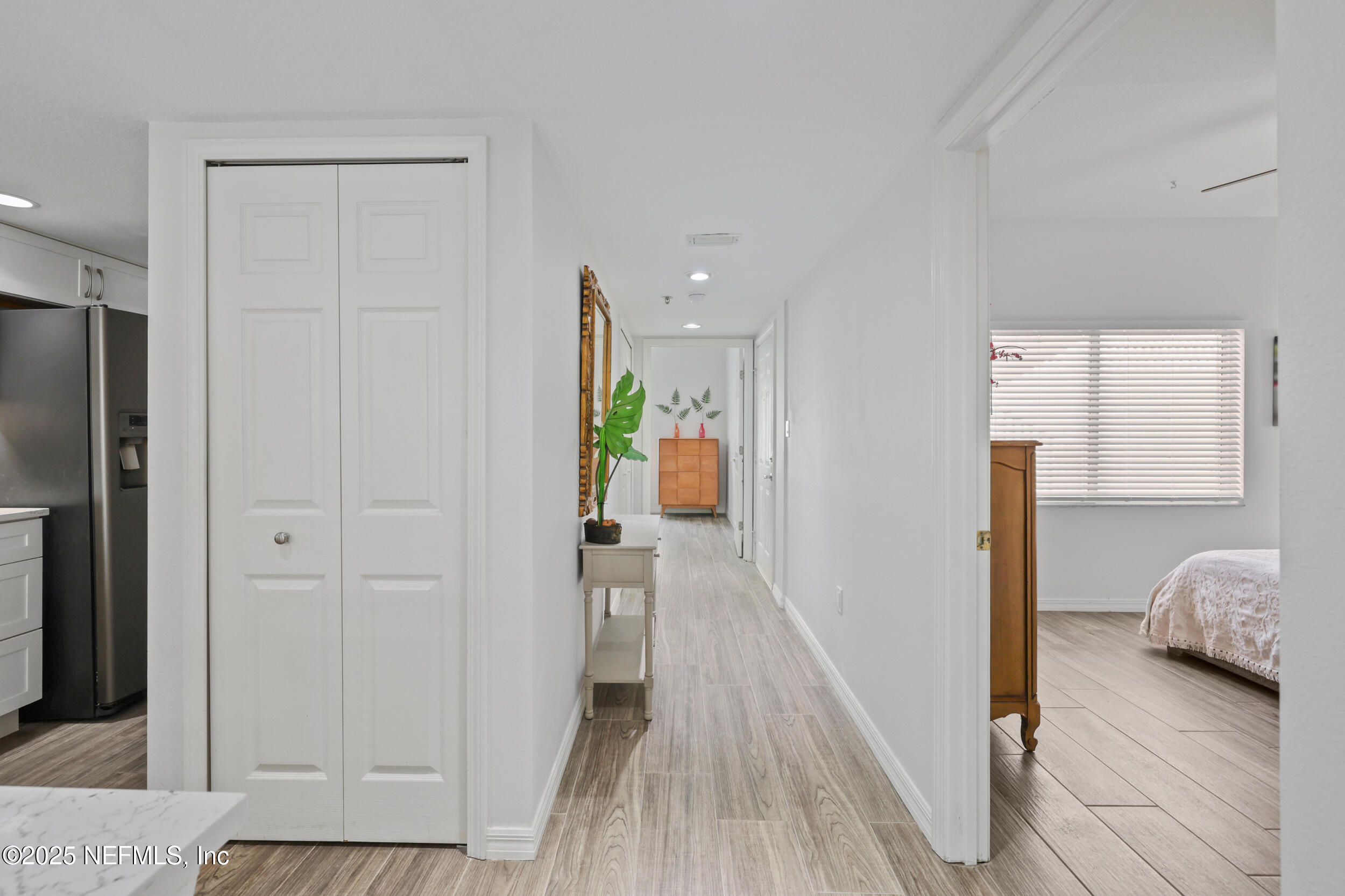 159 Marine Street, Unit 105 St. Augustine, FL 32084 - Photo 14 of 46 a view of hallway with wooden floor