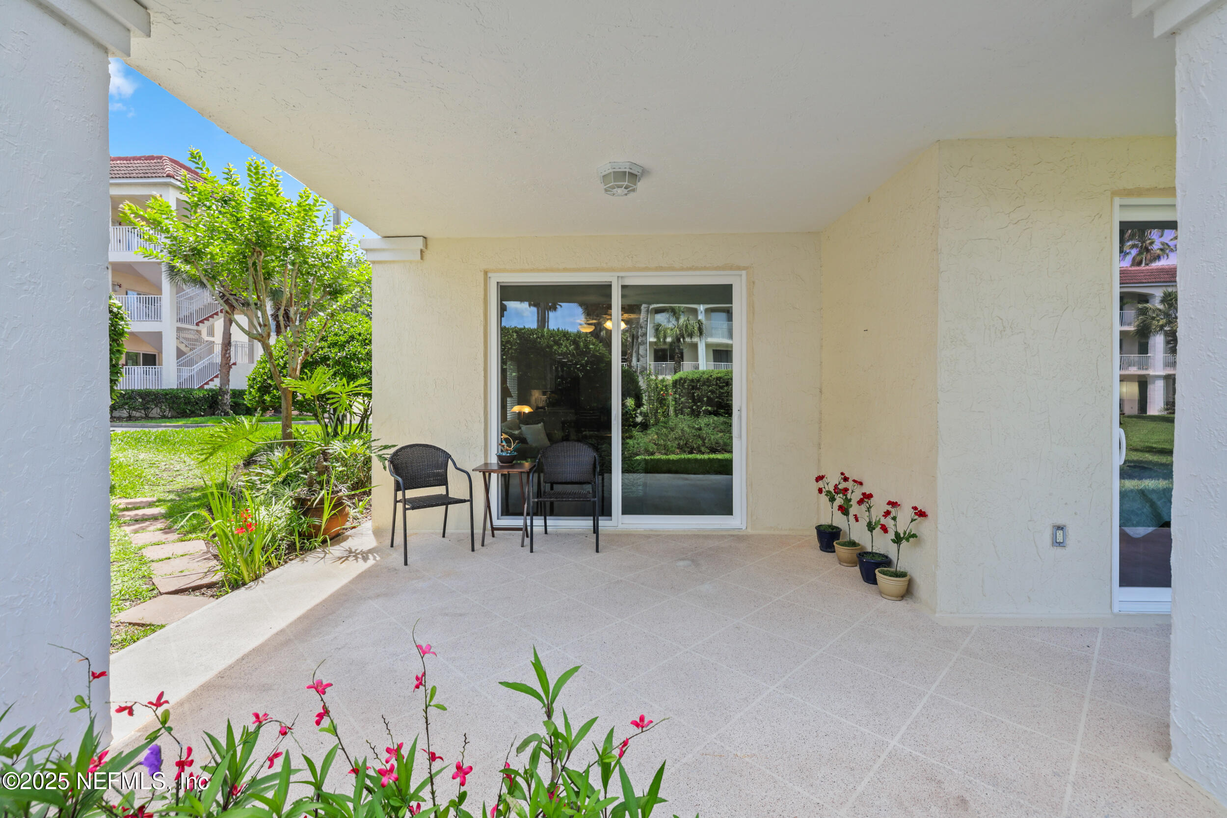 159 Marine Street, Unit 105 St. Augustine, FL 32084 - Photo 34 of 46 front view of a house with a yard