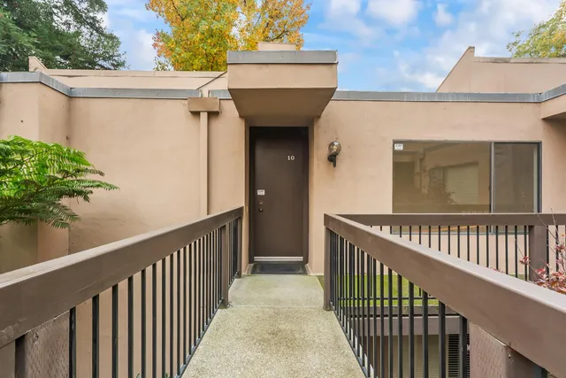 front view of a house with a garden