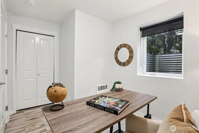 a living room with furniture and a window