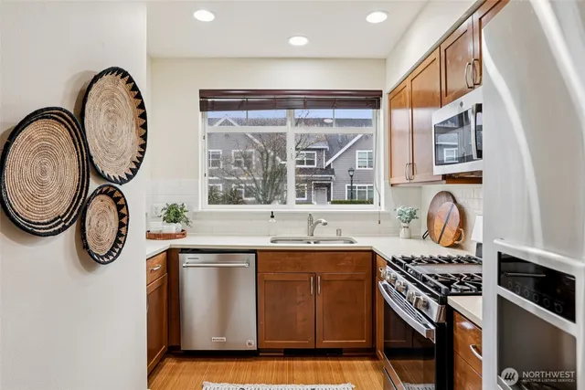 a kitchen with a sink and a stove