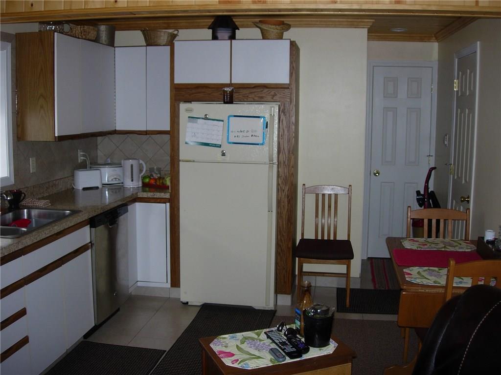 2610 Old Pittsburgh Road New Castle, PA 16101 - Photo 20 of 23 Kit. in the garage w/ t/g ceiling,oak cabinets,ceramic floor