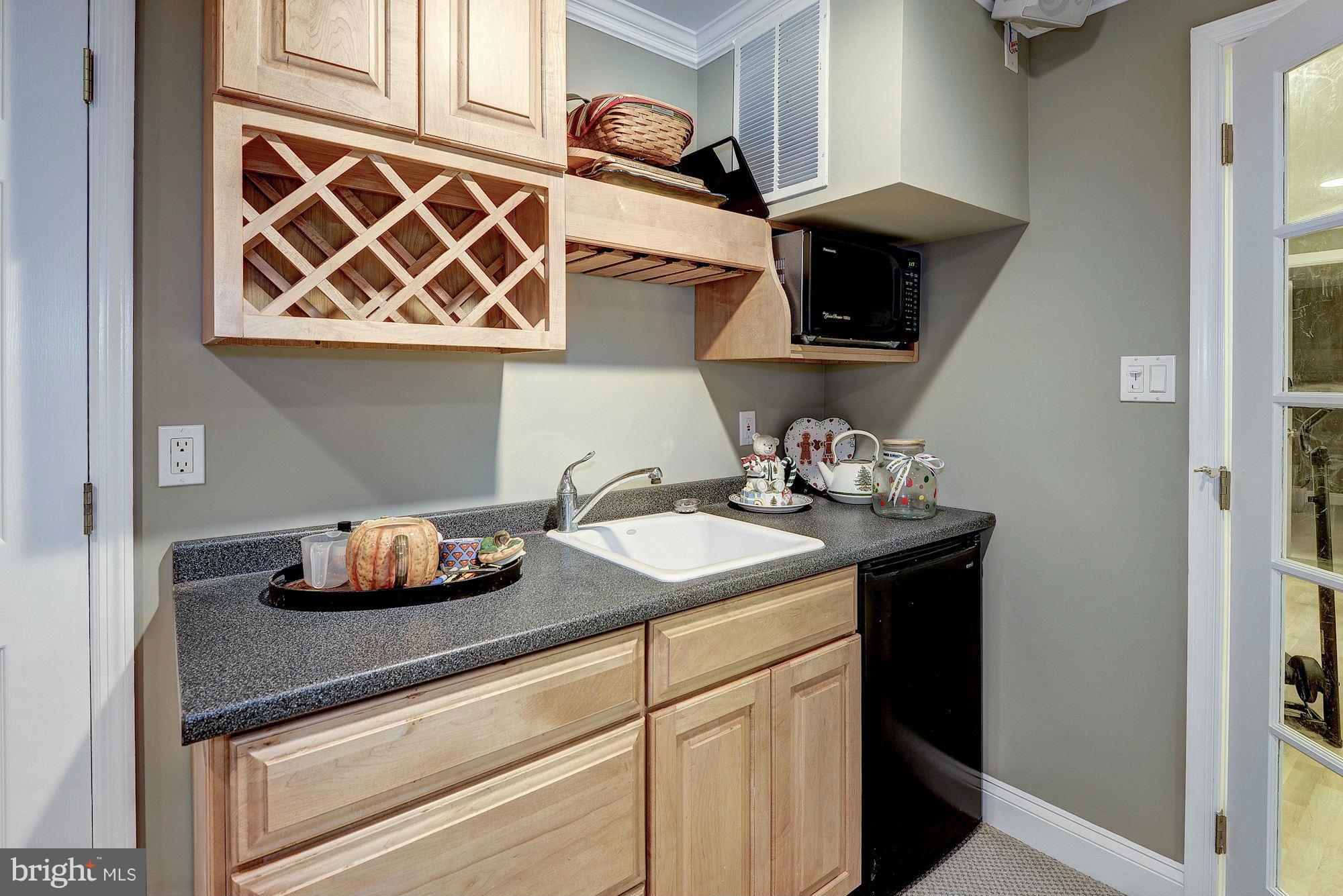 3100 Saddle Crest Lane Oakton, VA 22124 - Photo 24 of 30 Lower Level Wet Bar with mini Fridge