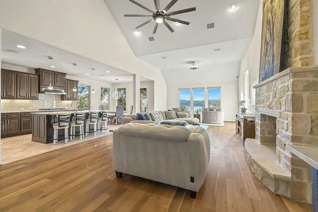 a living room with furniture and a fireplace