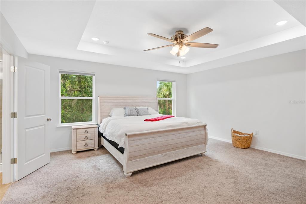 1137 Bradford Rdg Drive Leesburg, FL 34748 - Photo 15 of 37 a bedroom with a bed and window