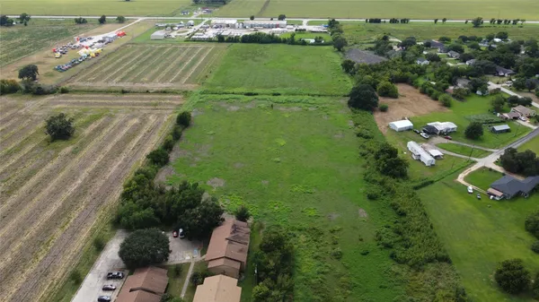 a view of a garden with a lake