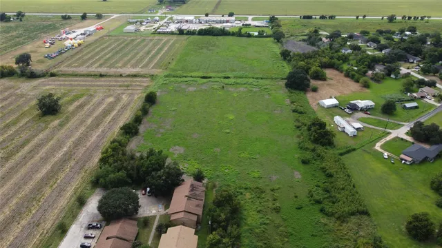 a view of a garden with a lake