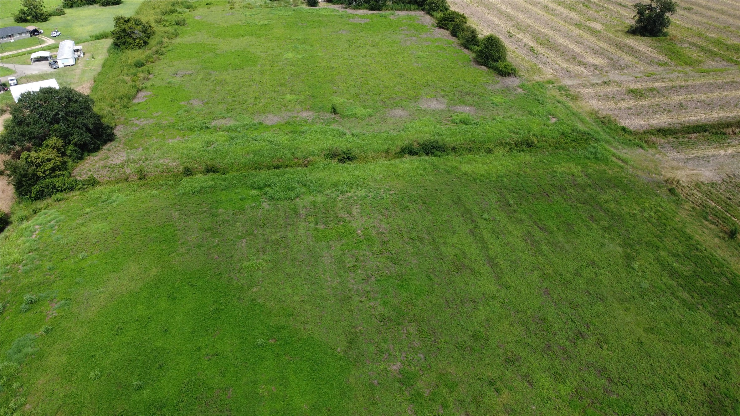 0 Nelga Road Wharton, TX 77488 - Photo 6 of 12 a view of a large yard with lots of green space