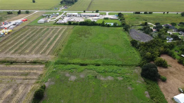 a view of a big yard with green space
