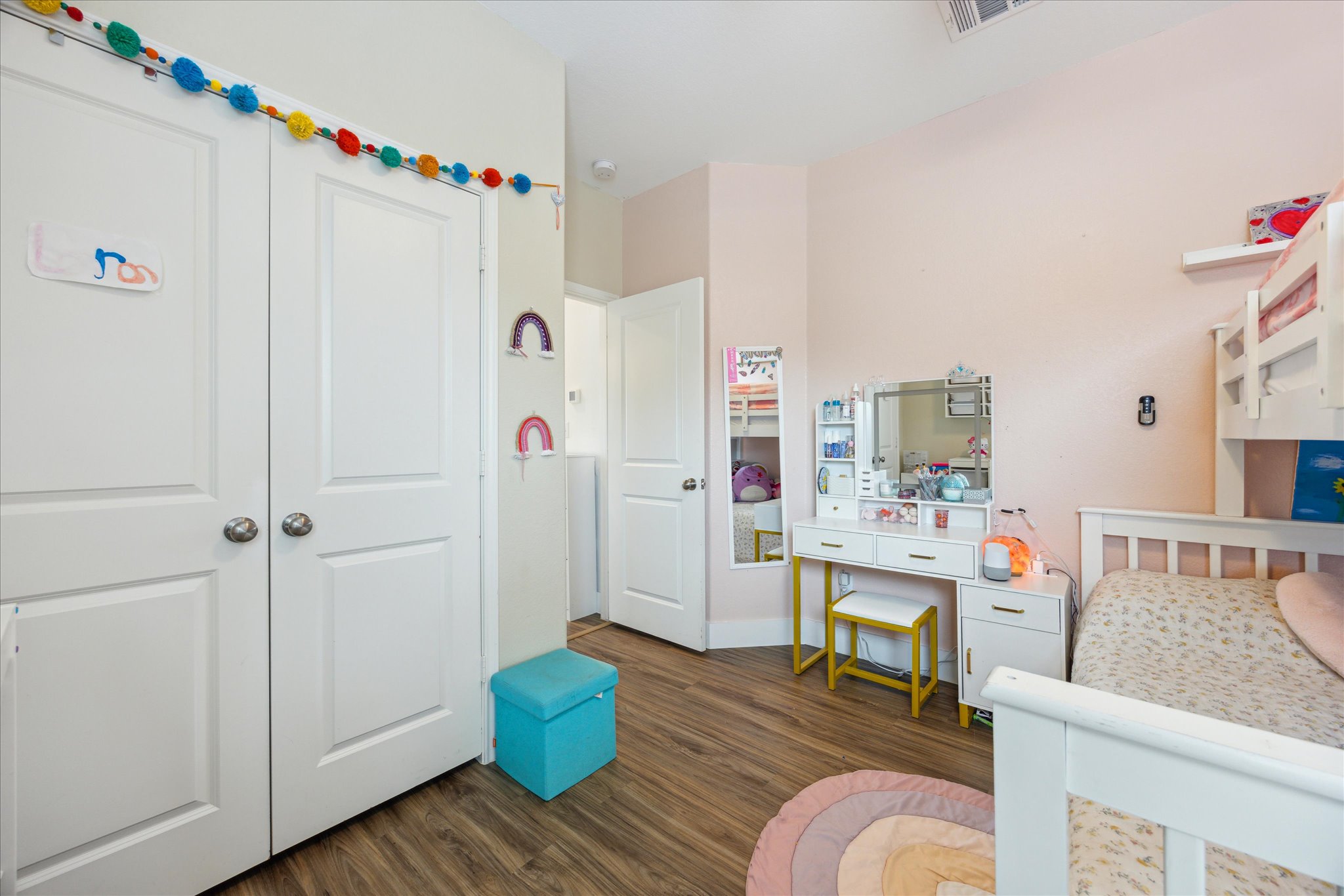 700 Legends Lane Georgetown, TX 78628 - Photo 21 of 31 Bedroom with dark wood-type flooring and baseboards