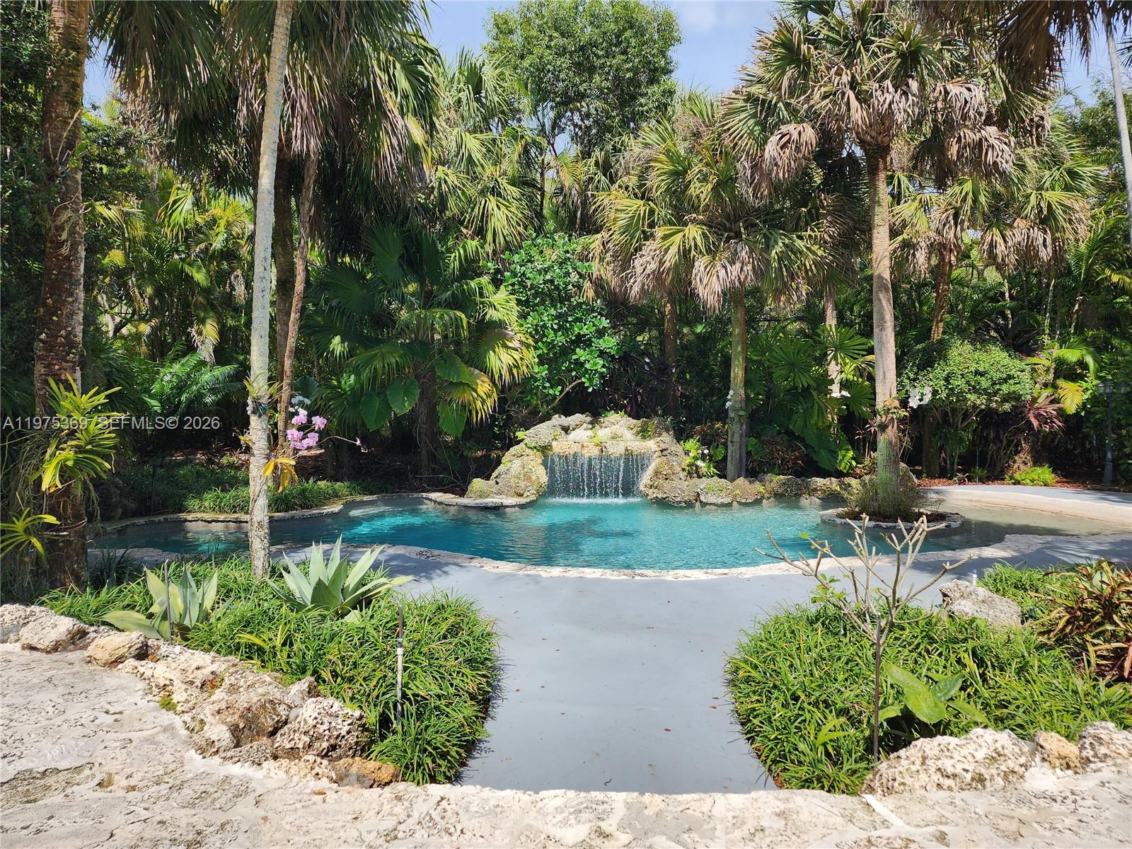 6065 Southwest 133rd Street Pinecrest, FL 33156 - Photo 23 of 41 a garden with lots of trees