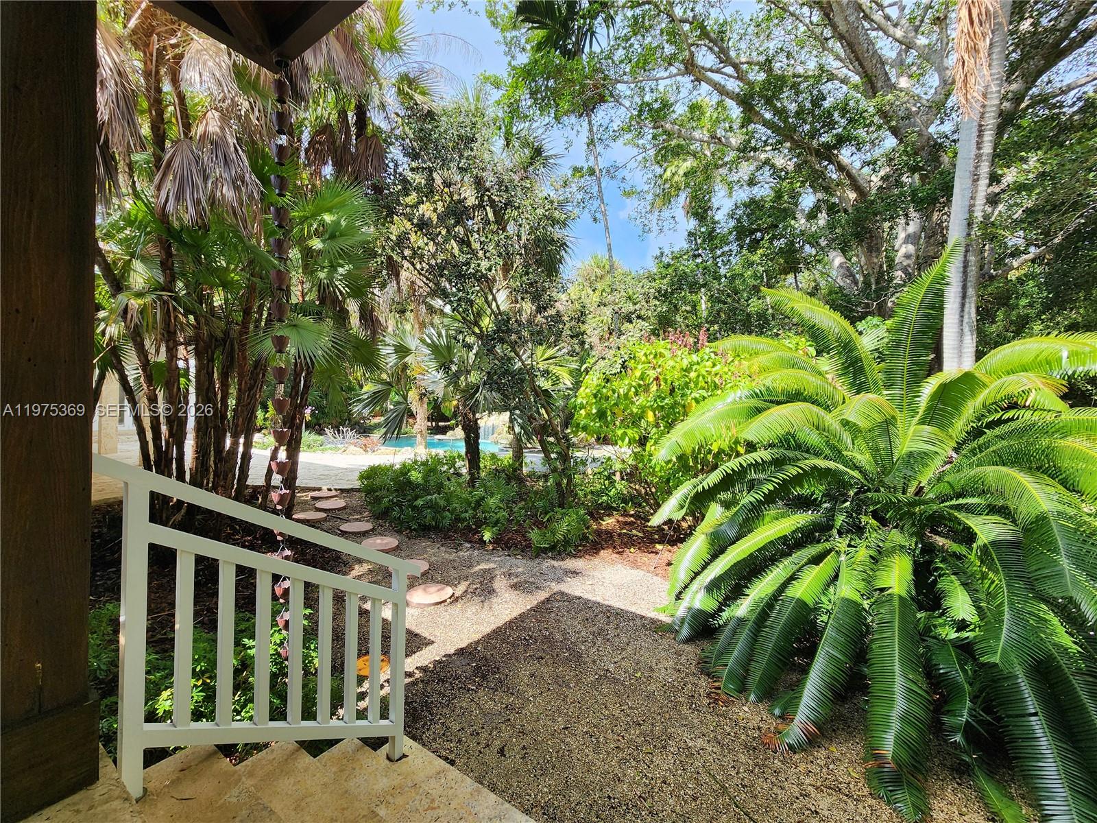 6065 Southwest 133rd Street Pinecrest, FL 33156 - Photo 33 of 41 a view of outdoor space and yard