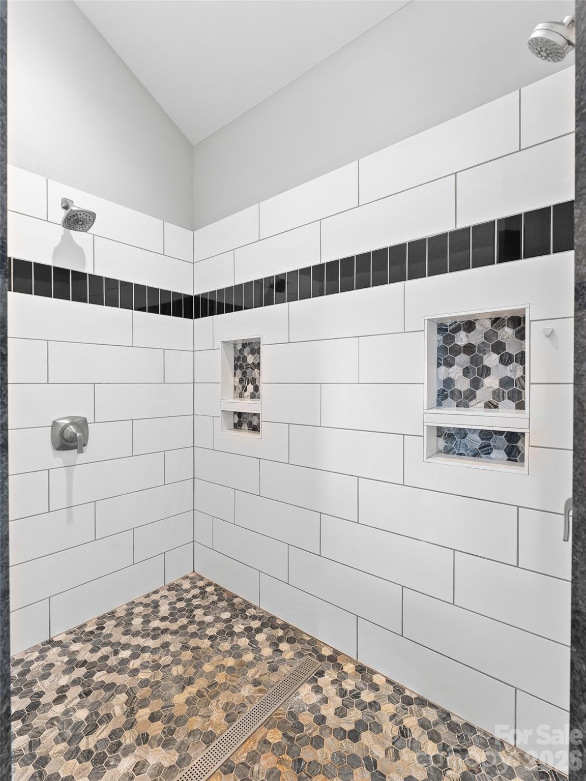 123 Israel Road Candler, NC 28715 - Photo 22 of 44 a bathroom with a shower