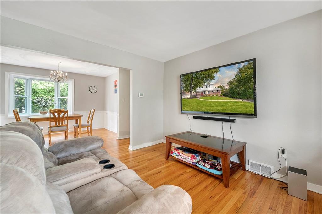15 Robin Road McKees Rocks, PA 15136 - Photo 11 of 25 Hardwood floors throughout the 1st floor. This is the living room when you come through the front door.