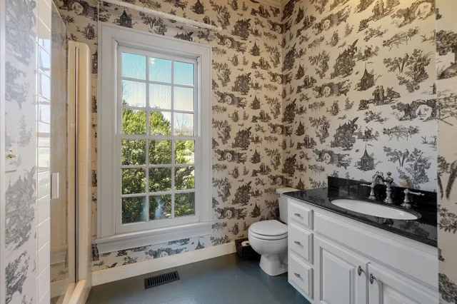 a view of a hallway view with staircase