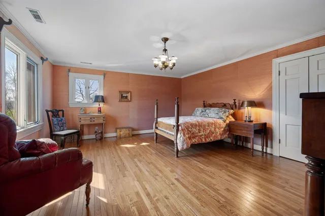 a view of a street with a building in the background