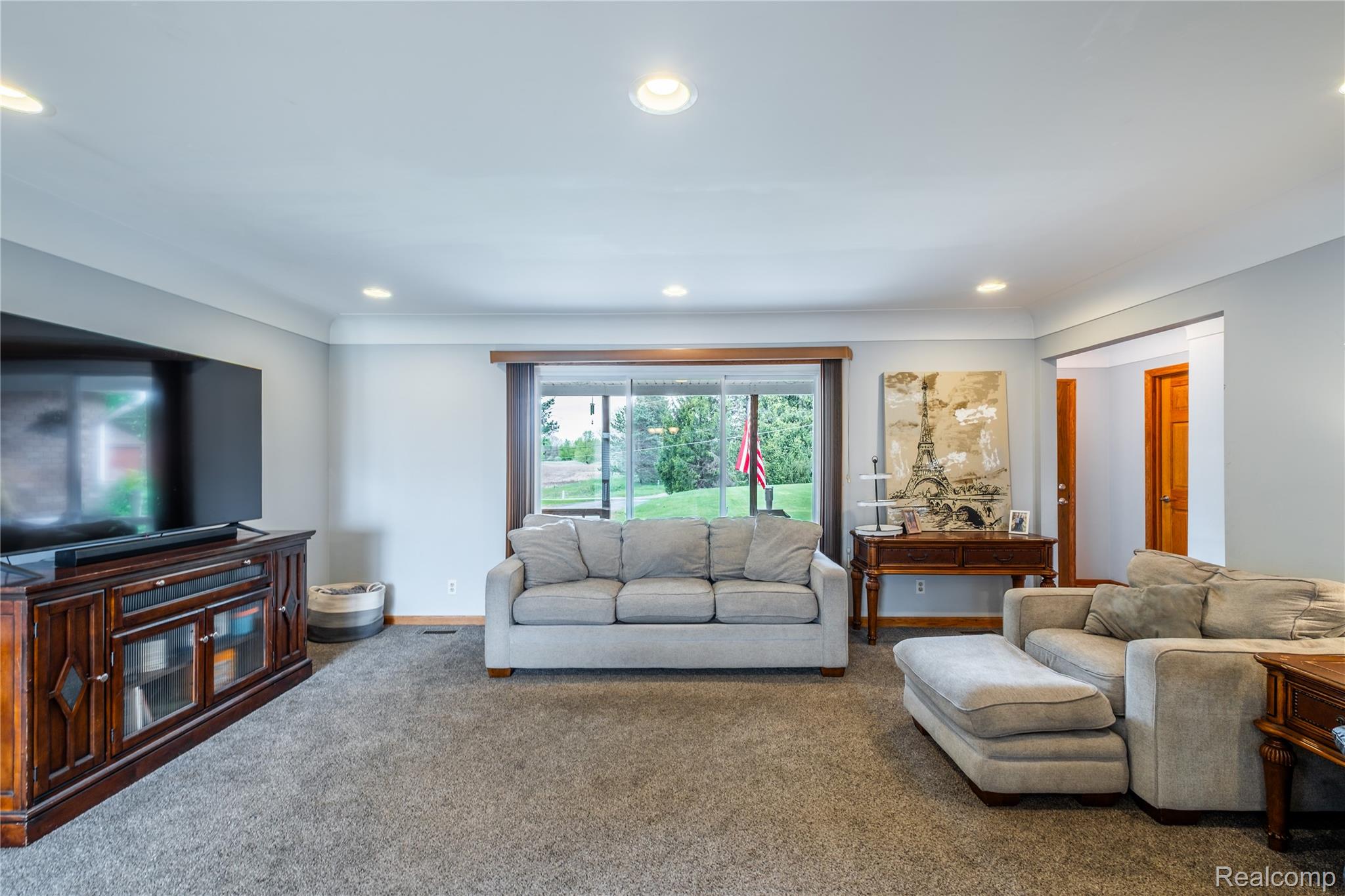 11430 Silver Lake Road Byron, MI 48418 - Photo 8 of 32 Carpeted living area featuring recessed lighting
