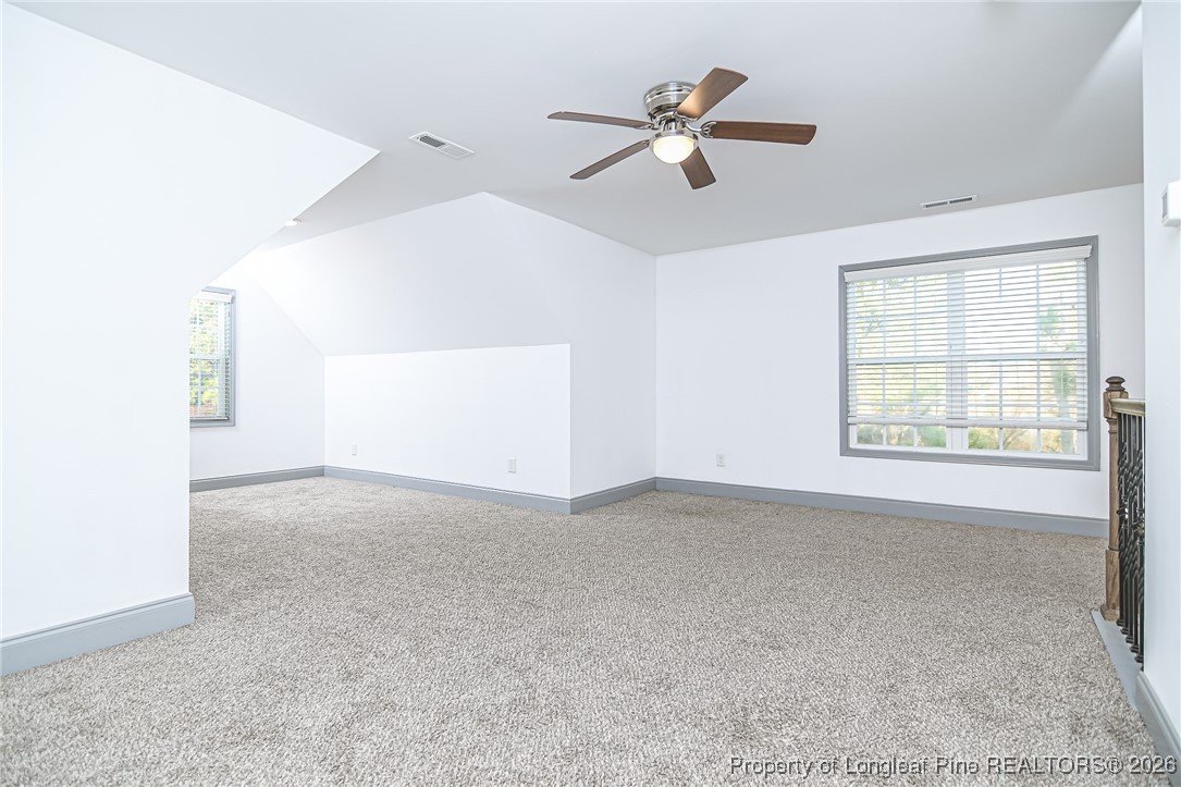 808 Mumford Road Raeford, NC 28376 - Photo 36 of 50 a view of an empty room with a window