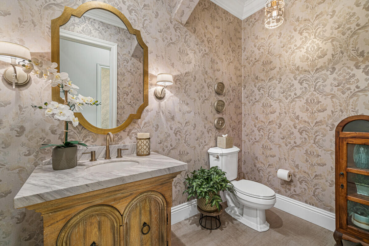 2280 Queen Palm Road Boca Raton, FL 33432 - Photo 14 of 21 a bathroom with a granite countertop toilet sink and mirror