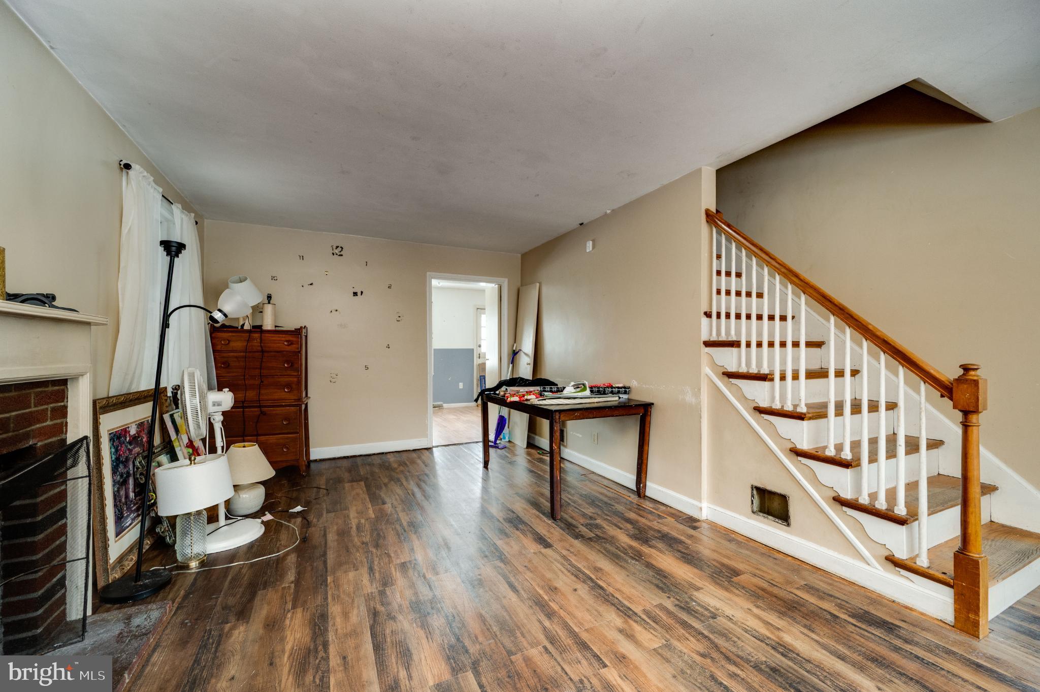 9 West 35th Street Reading, PA 19606 - Photo 16 of 52 a living room with furniture and a wooden floor