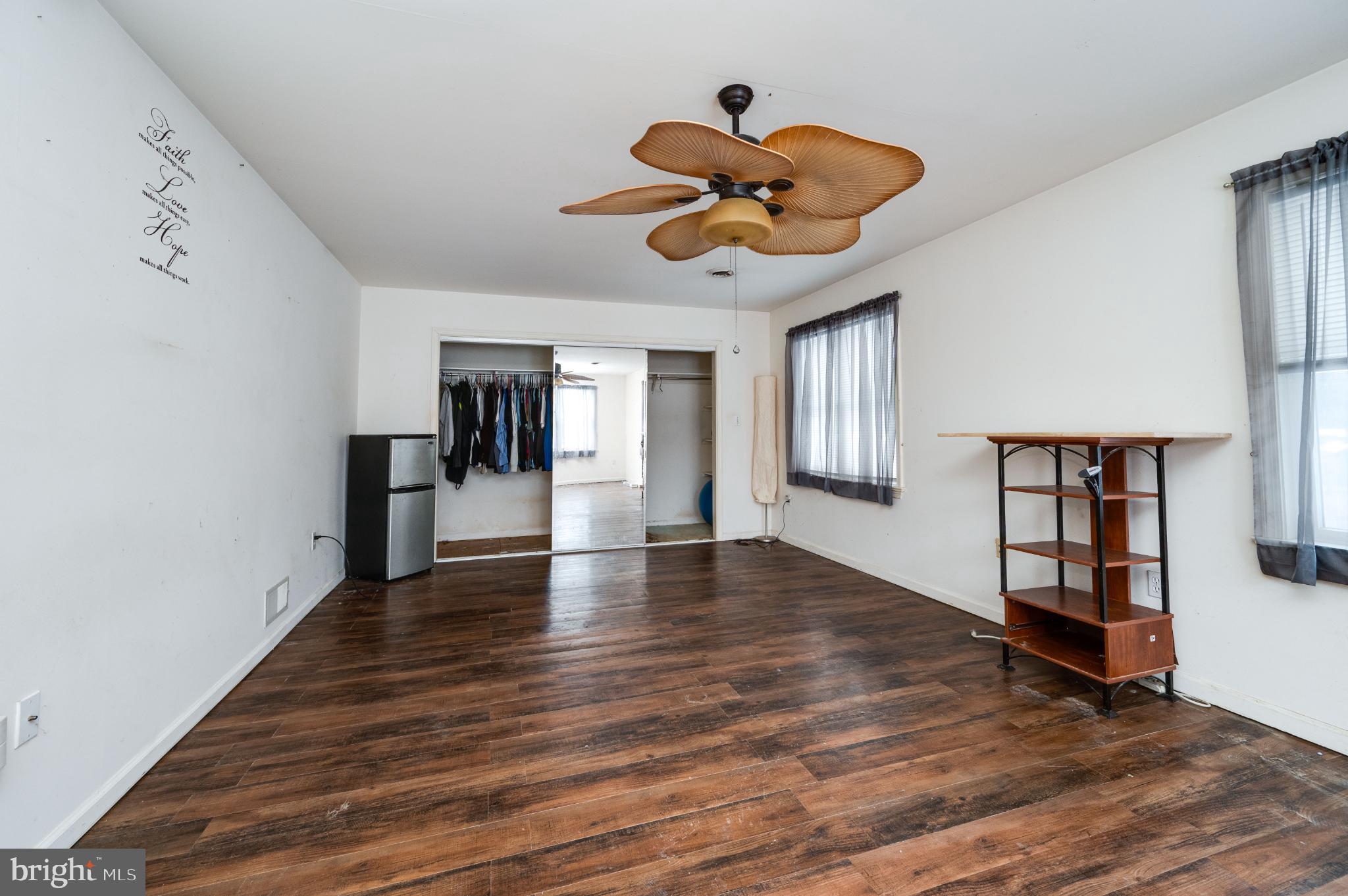 9 West 35th Street Reading, PA 19606 - Photo 34 of 52 a view of an empty room with window and wooden floor