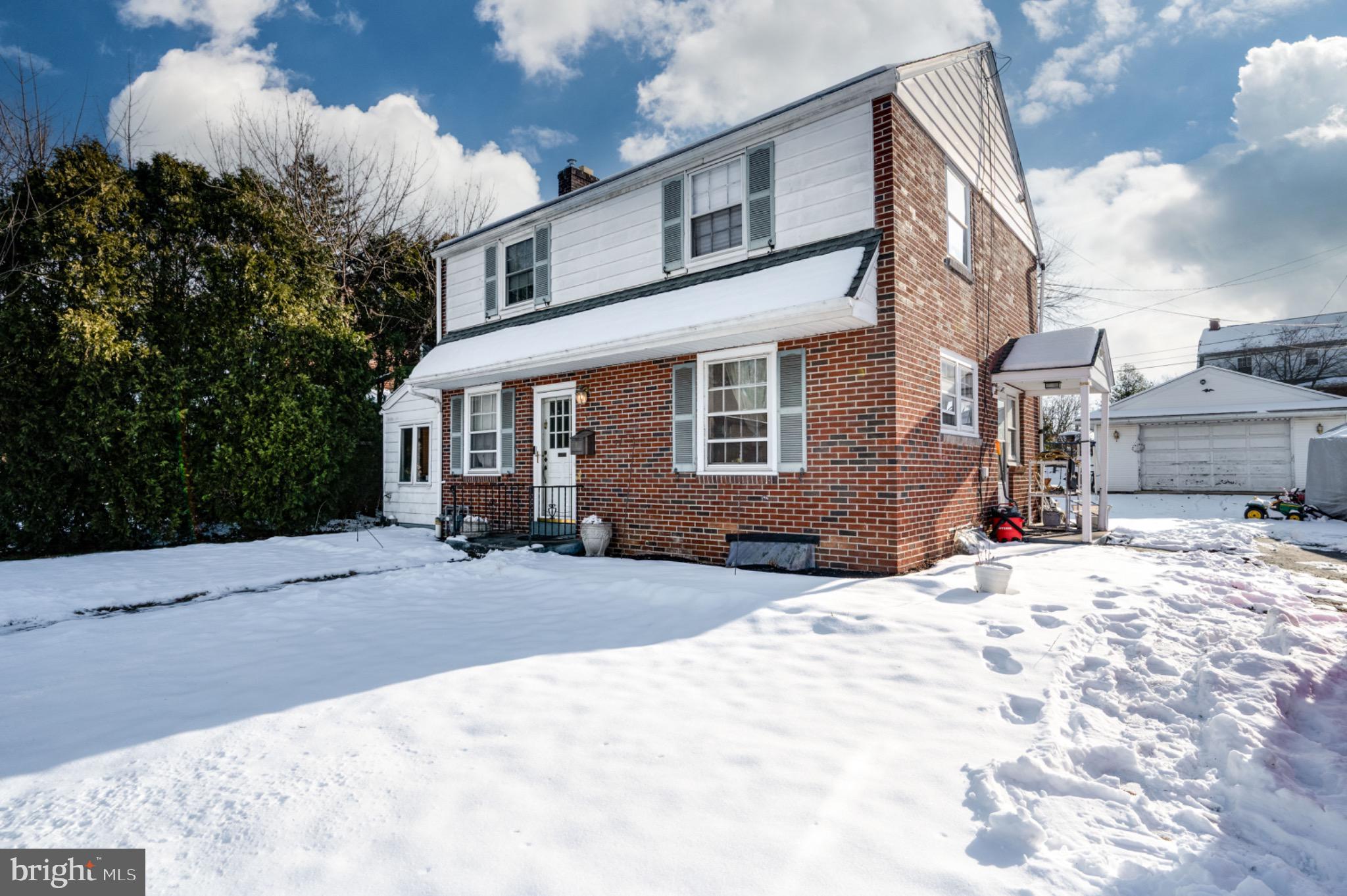 9 West 35th Street Reading, PA 19606 - Photo 4 of 14 Charming brick home in a winter wonderland.