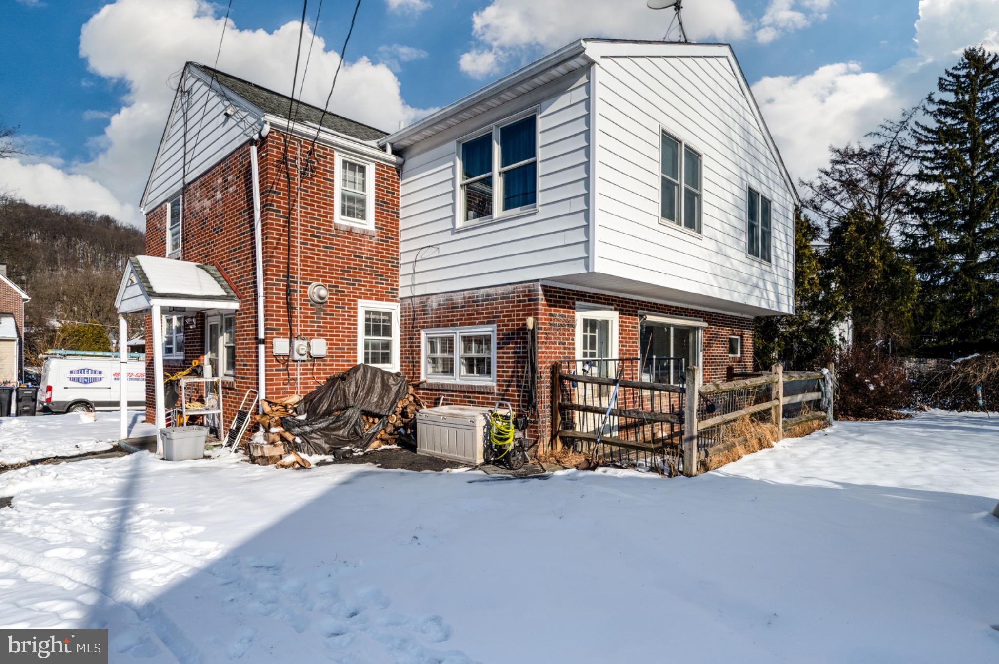 9 West 35th Street Reading, PA 19606 - Photo 8 of 14 Charming home nestled in a snowy landscape.