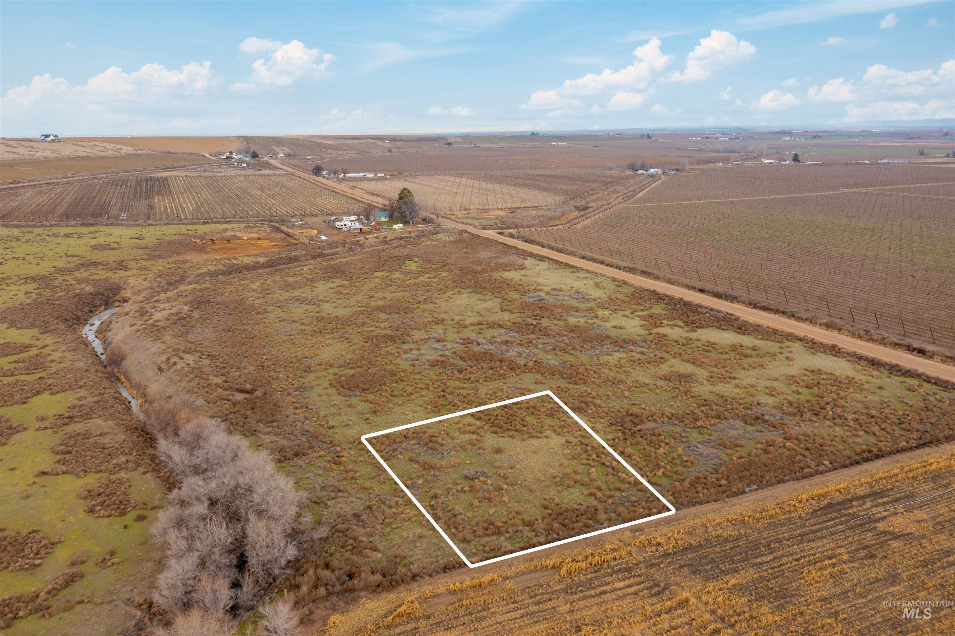 Tbd Monte Road Parma, ID 83660 - Photo 2 of 8 Overview of rural landscape featuring large plots for crops and property boundaries highlighted