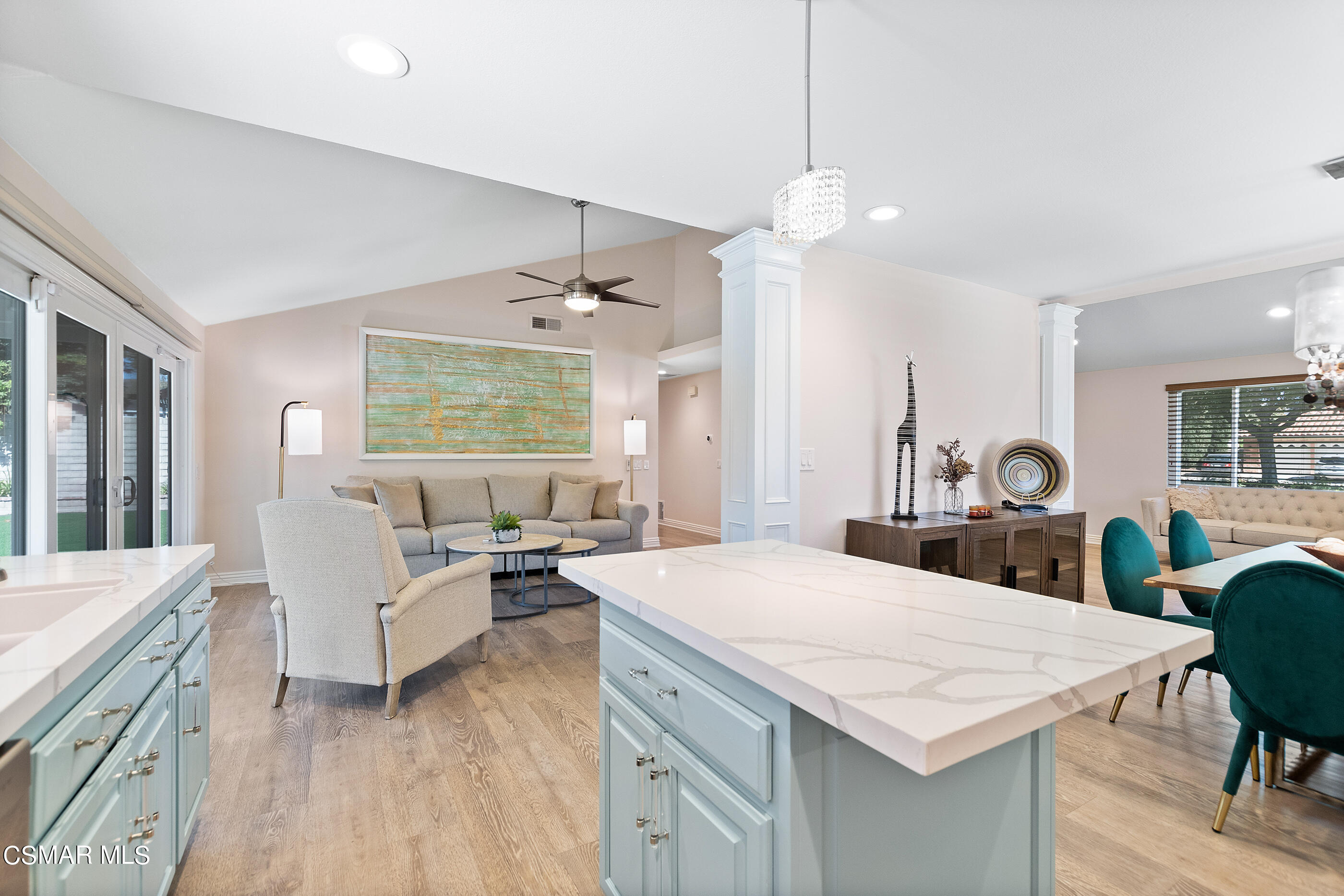 2835 Topaz Avenue Simi Valley, CA 93063 - Photo 14 of 42 a living room with stainless steel appliances kitchen island granite countertop furniture and a chandelier
