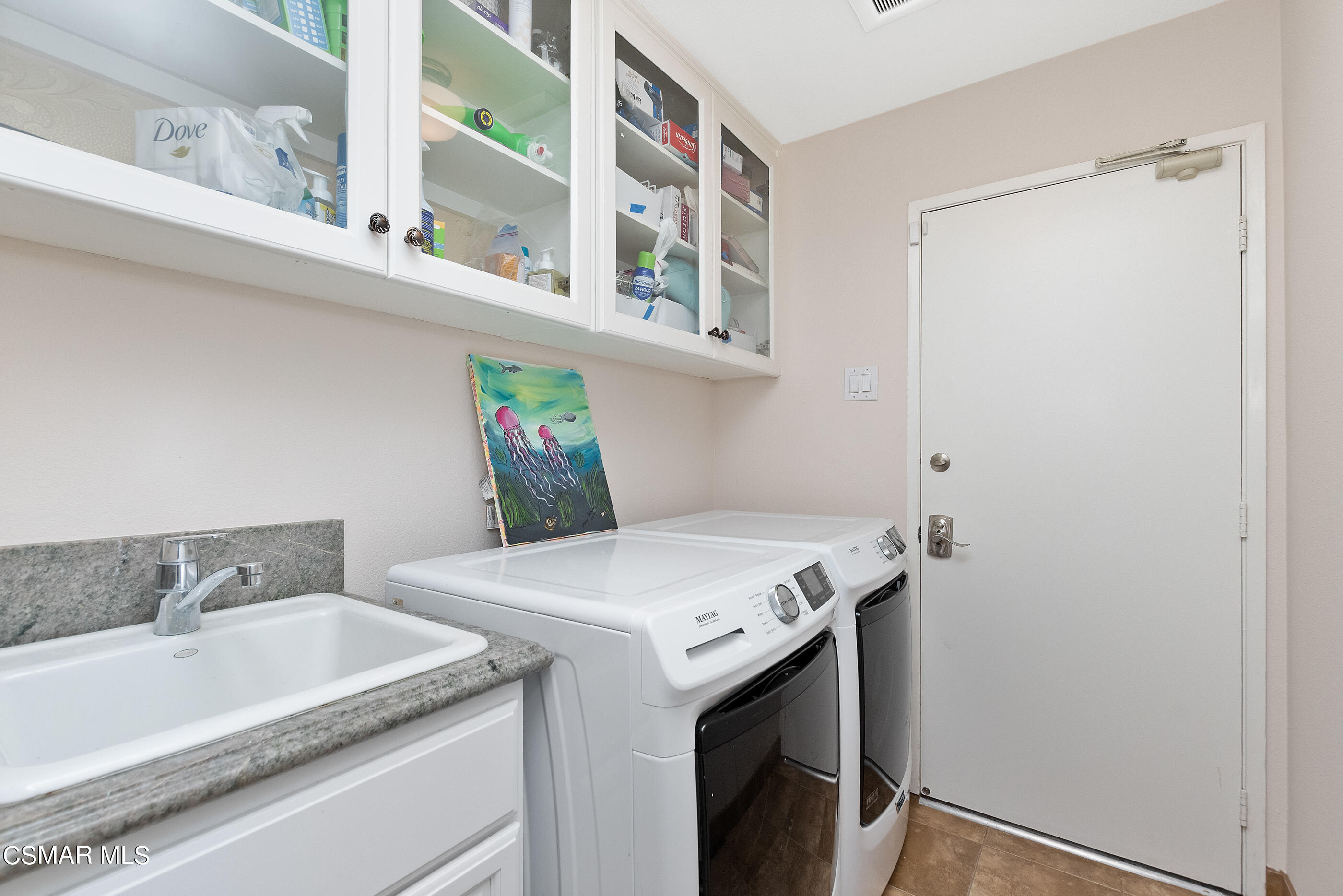 2835 Topaz Avenue Simi Valley, CA 93063 - Photo 28 of 42 a utility room with dryer and washer