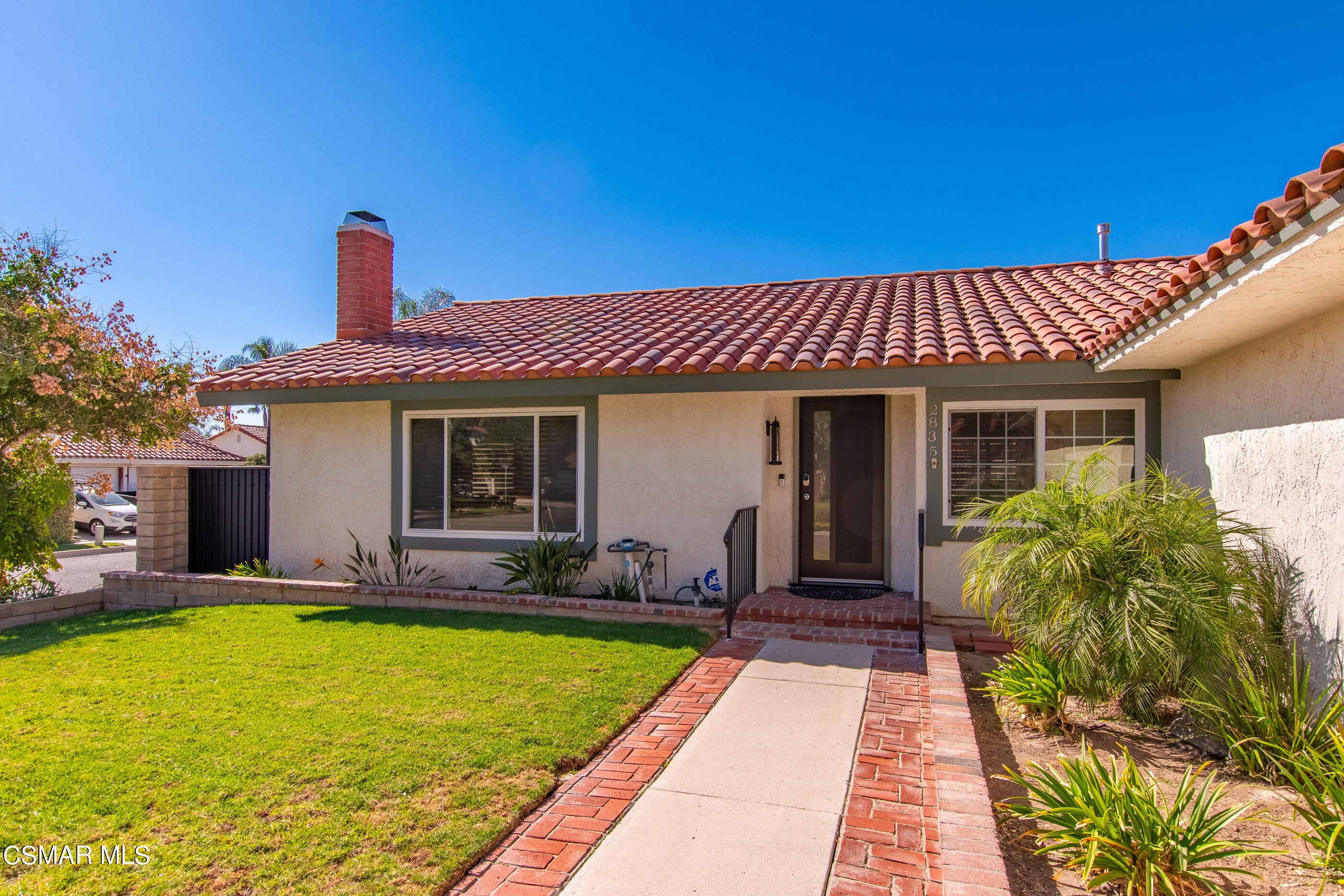 2835 Topaz Avenue Simi Valley, CA 93063 - Photo 36 of 42 a front view of a house with garden
