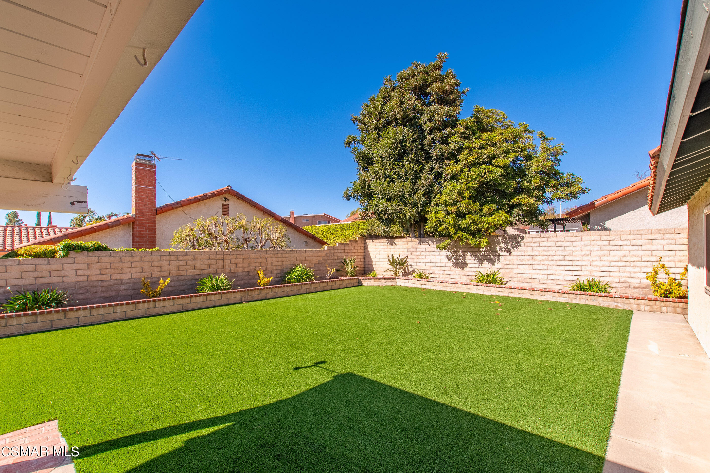2835 Topaz Avenue Simi Valley, CA 93063 - Photo 37 of 42 a view of a garden with a house