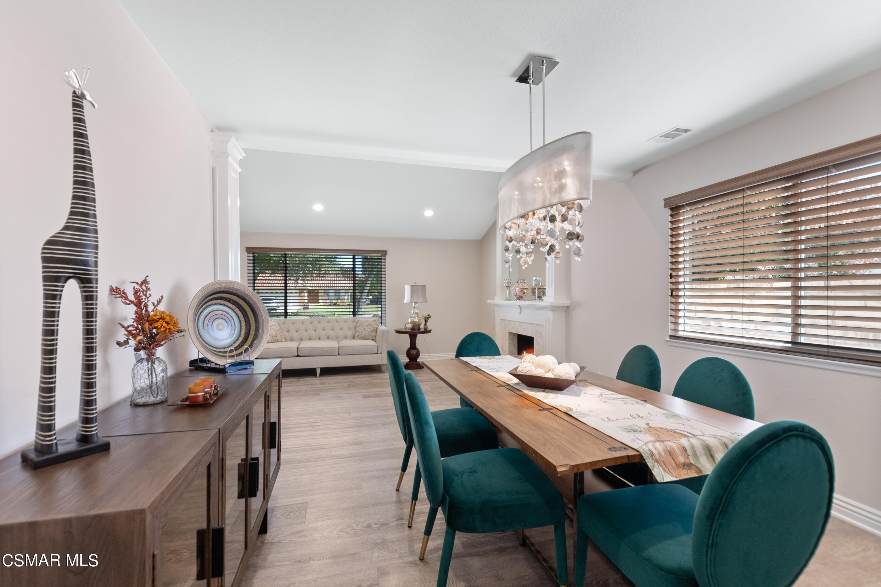 2835 Topaz Avenue Simi Valley, CA 93063 - Photo 9 of 42 a view of a dining room with furniture and wooden floor