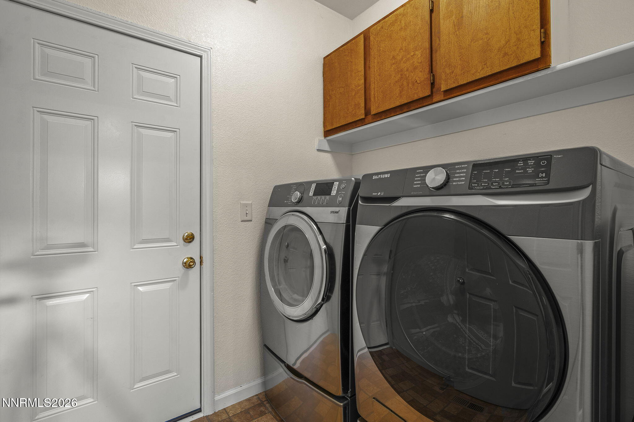 750 West Golden Valley Road Reno, NV 89506 - Photo 24 of 41 a utility room with dryer and washer