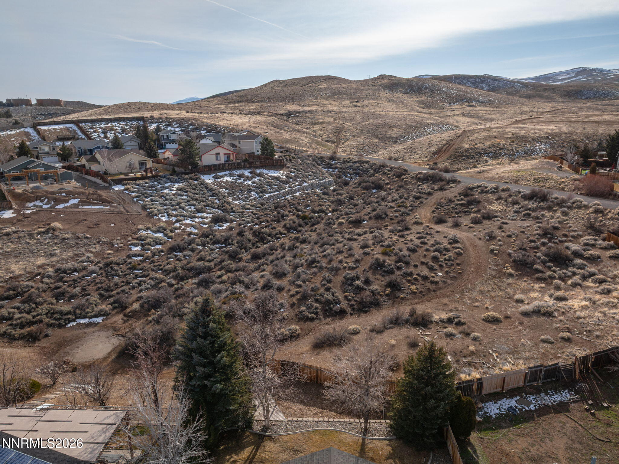 750 West Golden Valley Road Reno, NV 89506 - Photo 40 of 41 a view of a mountain range in a cloudy sky