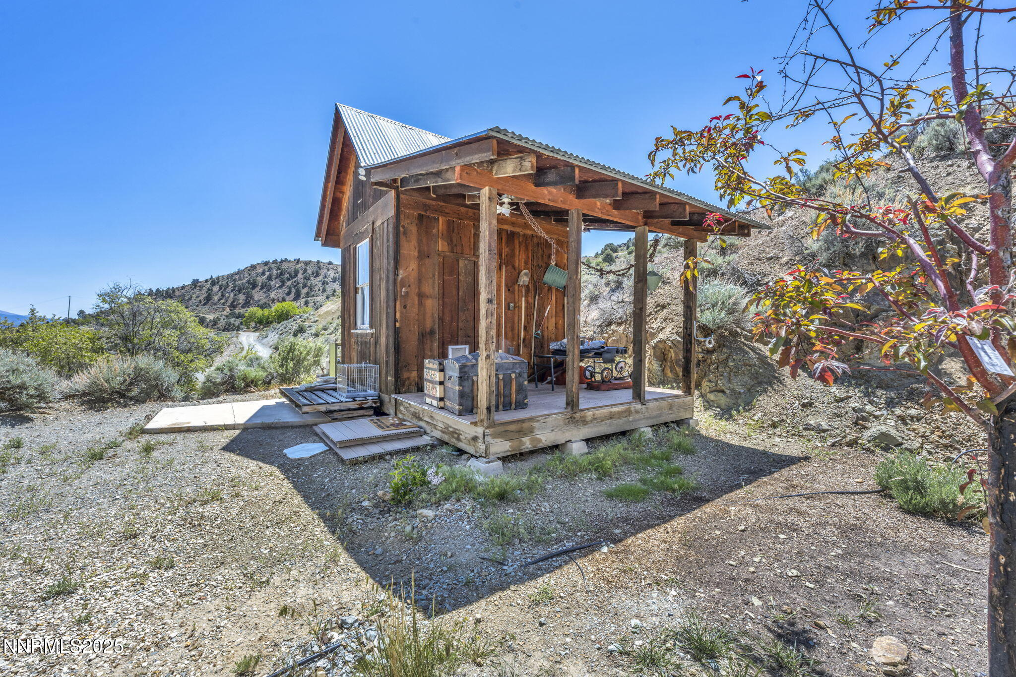 70 4th Street Silver City, NV 89428 - Photo 21 of 29 a front view of a house with garden