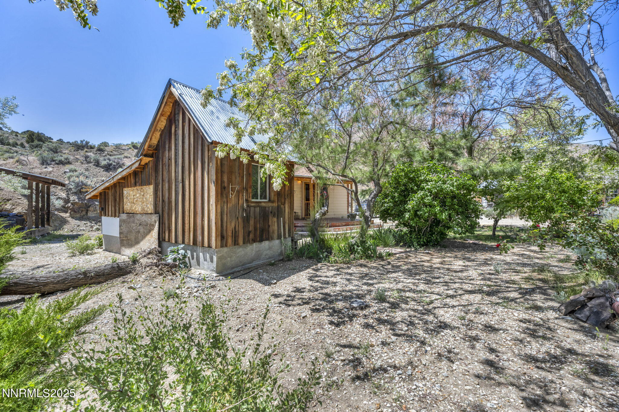 70 4th Street Silver City, NV 89428 - Photo 23 of 29 a view of a house with a yard