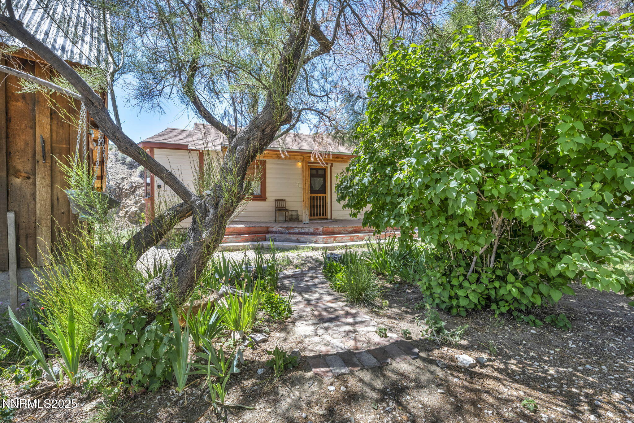 70 4th Street Silver City, NV 89428 - Photo 26 of 29 a front view of a house with a yard