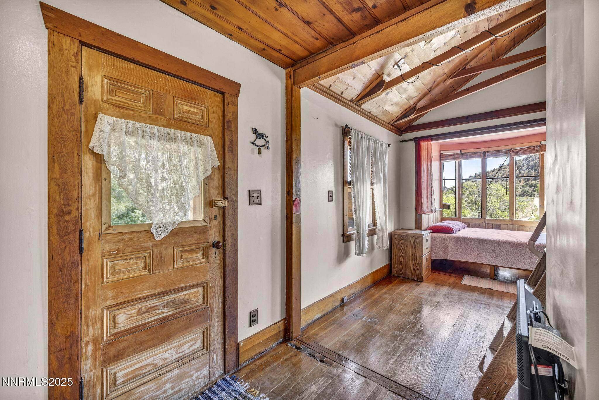 70 4th Street Silver City, NV 89428 - Photo 5 of 29 a room with window and furniture