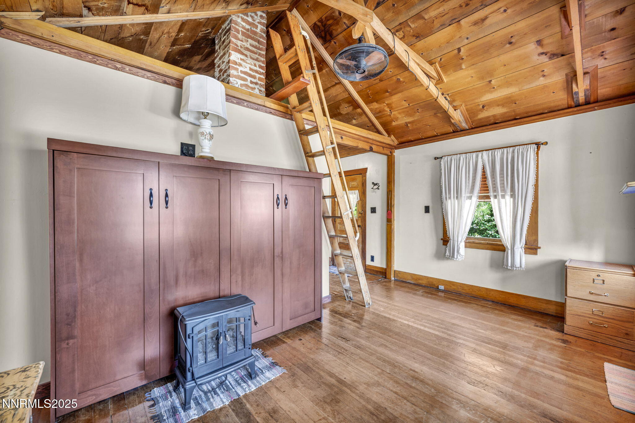 70 4th Street Silver City, NV 89428 - Photo 8 of 29 a view of an entryway with wooden floor