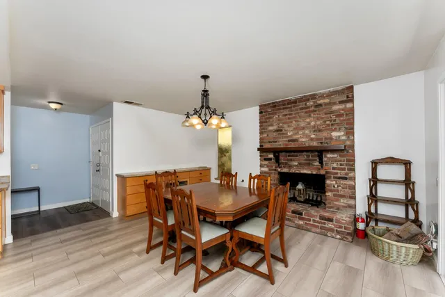 a bedroom with a bed and flat screen tv