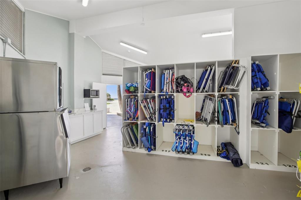3390 Bayou Sound Longboat Key, FL 34228 - Photo 50 of 59 a view of a walk in closet with clothes and shoes