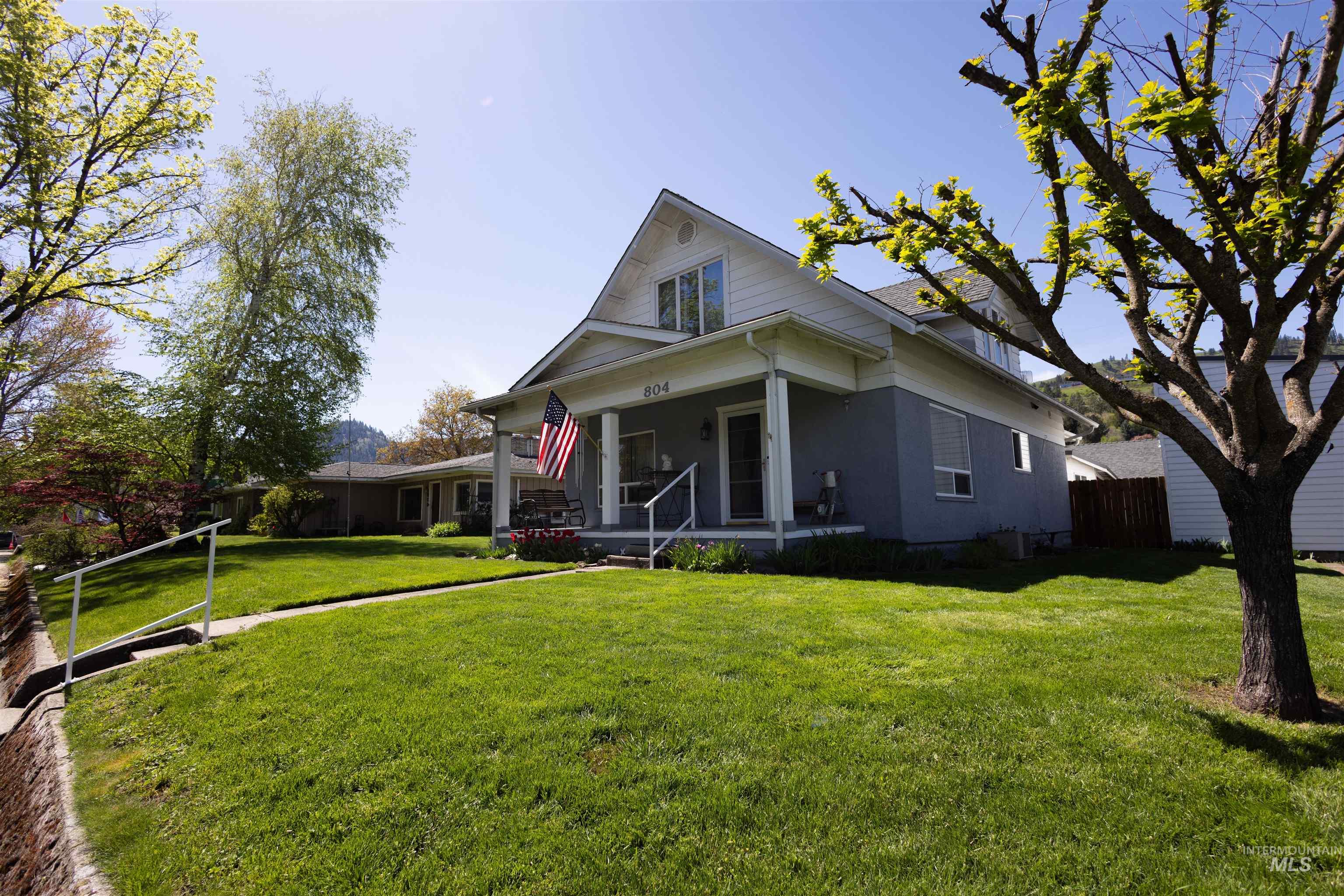 804 Maple Street Kamiah, ID 83536 - Photo 2 of 50 Traditional architecture featuring a covered porch, gabled roofline, and dormer window