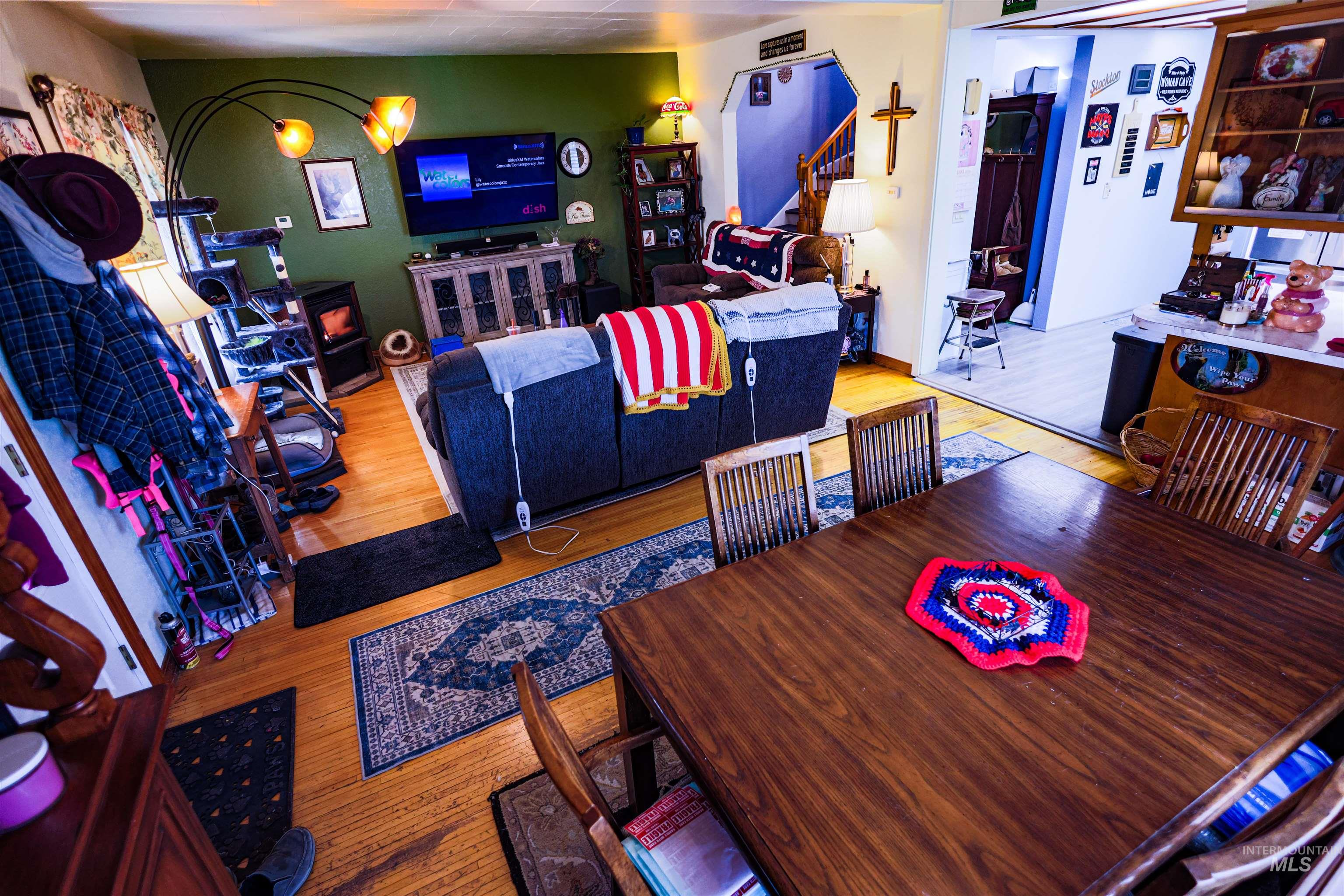 804 Maple Street Kamiah, ID 83536 - Photo 26 of 50 Living room featuring stairs and wood finished floors