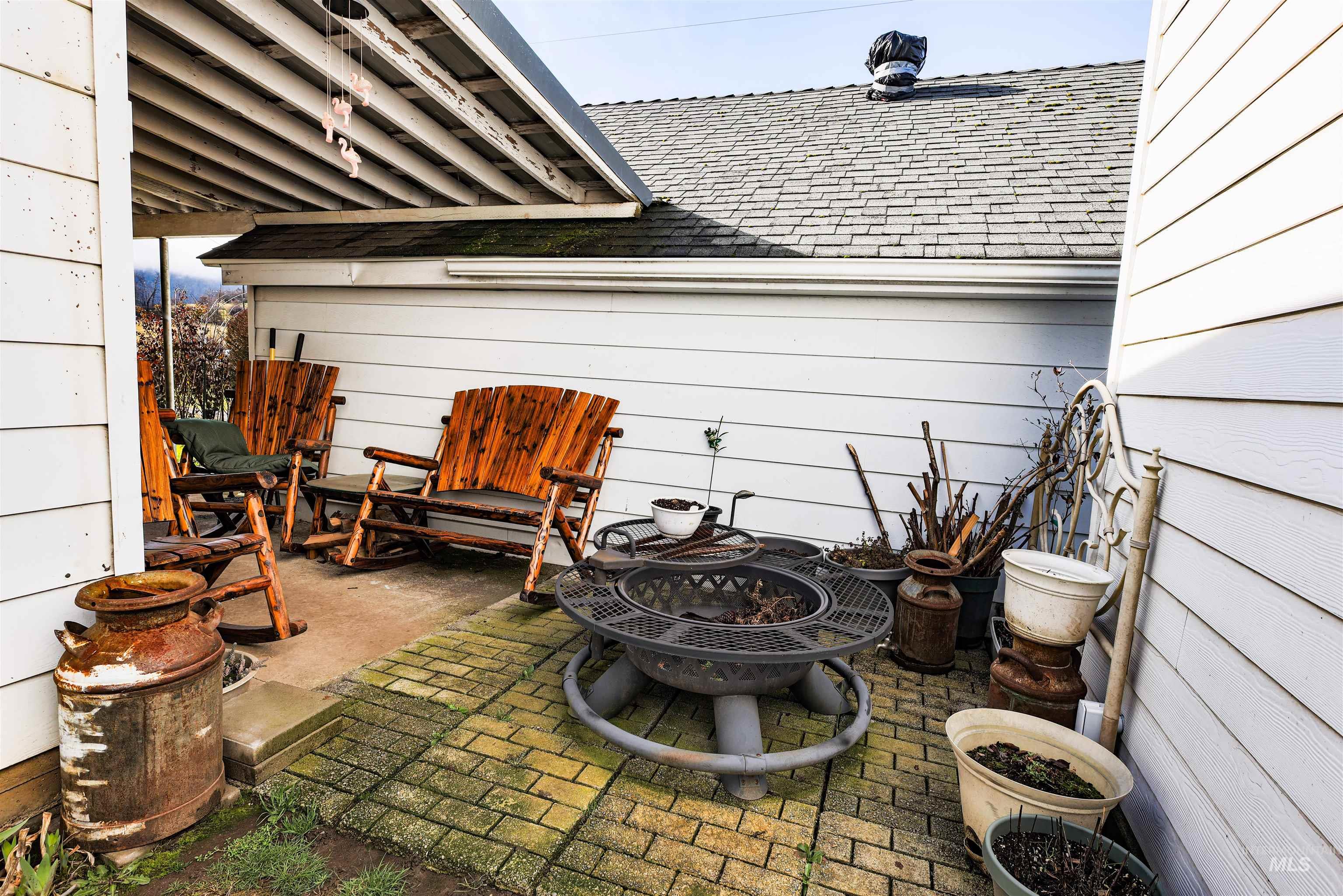 804 Maple Street Kamiah, ID 83536 - Photo 34 of 50 View of patio / terrace featuring a fire pit
