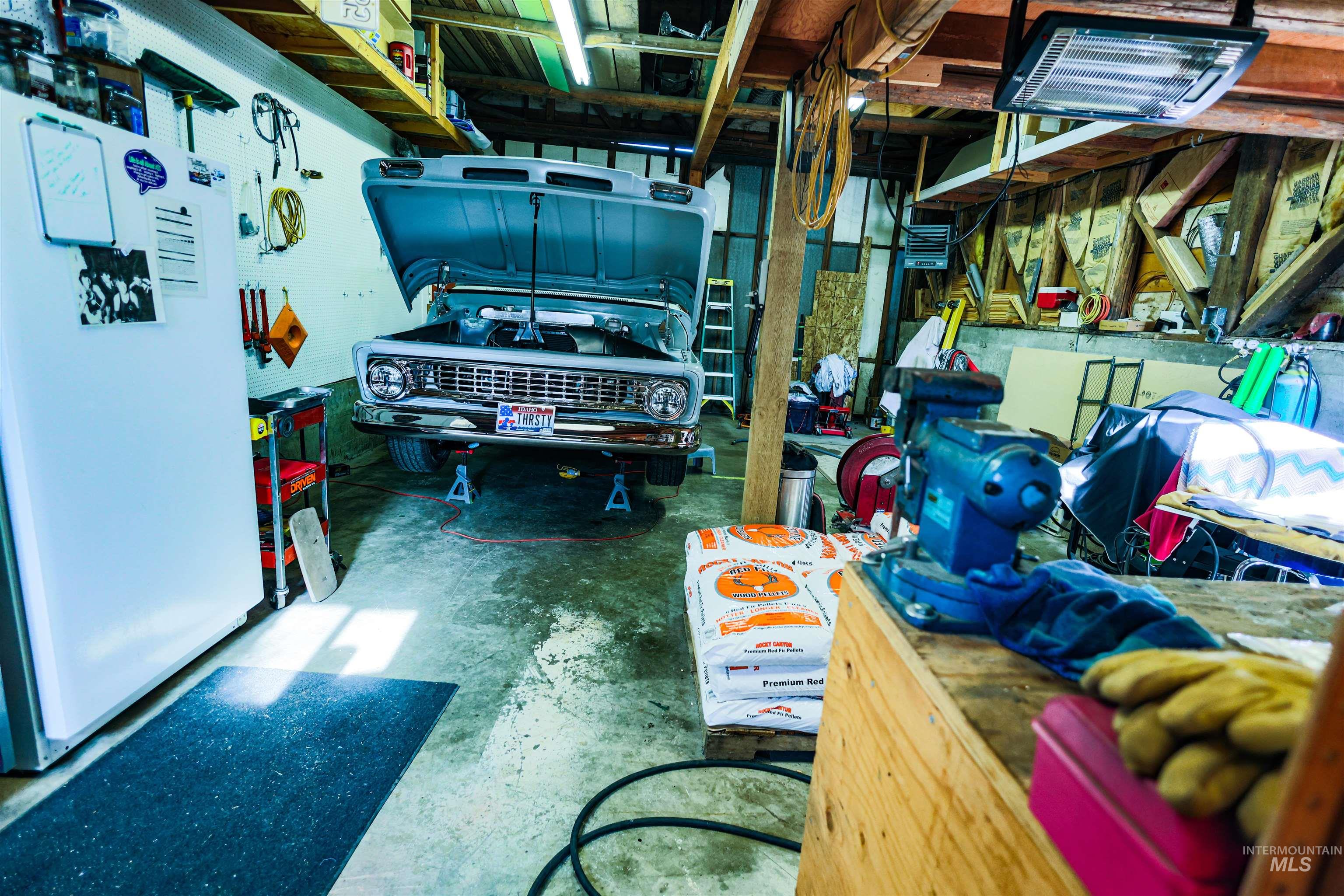 804 Maple Street Kamiah, ID 83536 - Photo 36 of 50 Garage with freestanding refrigerator