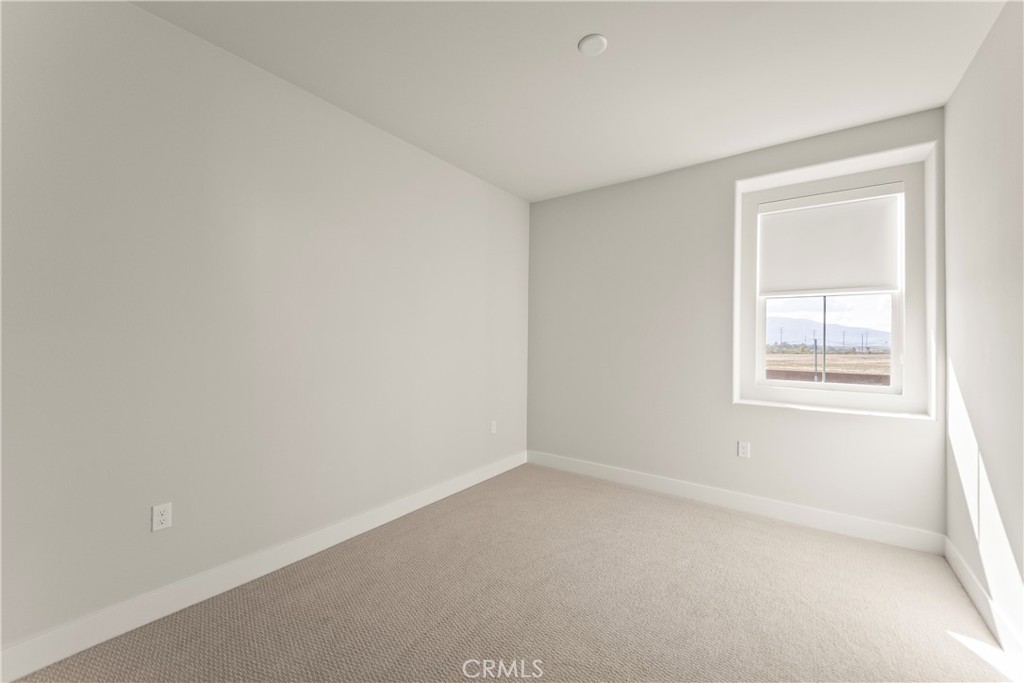 16717 Dara Avenue Chino, CA 91708 - Photo 25 of 41 an empty room with a window